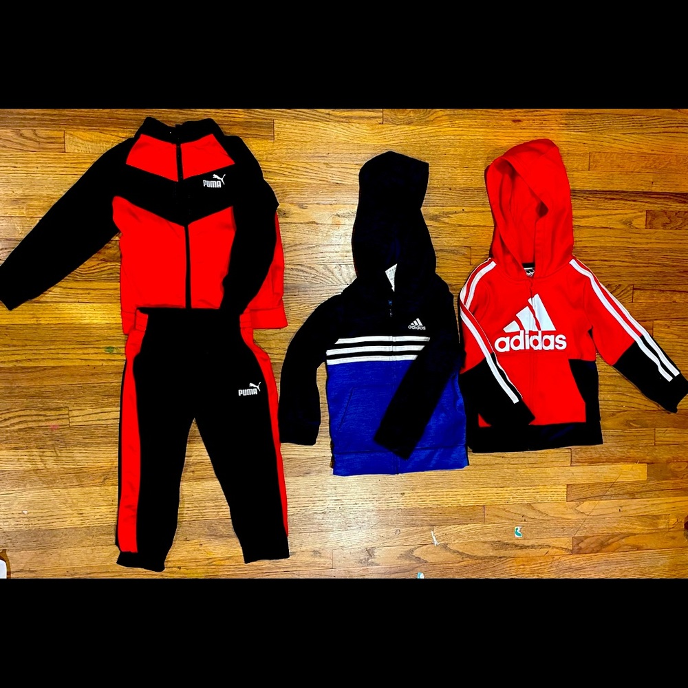 Adidas and Puma track suits